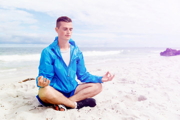 Man training on beach outside