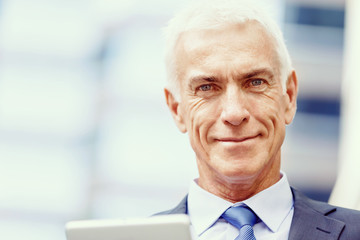 Portrait of confident businessman outdoors