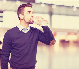 man drinking water