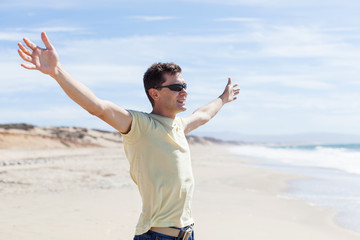 man with hands wide open