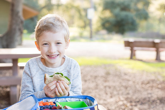 Schoolkid Eating Lunch