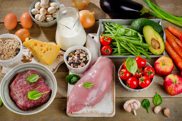 Assortment of Fresh Vegetables and Meats for Healthy Diet on a r