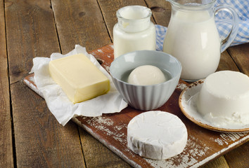 Obraz na płótnie Canvas Fresh Dairy products on wooden table