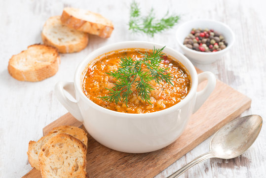 tomato soup with rice, vegetables and bread