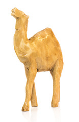 Handmade wooden camel on white background