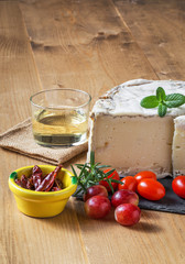 Close-up of grape,mint,rosemary,cheese and tomatoes