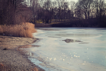 Winter landscape in Bavaria - lake with frozen surface