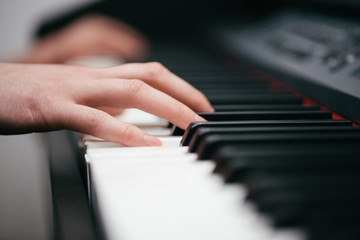 Fototapeta na wymiar hands playing piano
