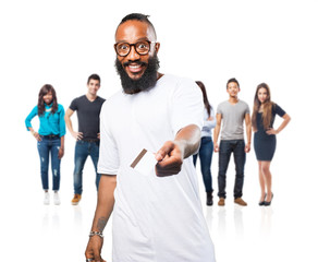Obraz premium black man holding a credit card