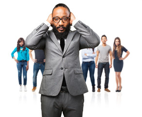 business black man covering his ears