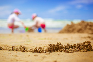 Fototapeta na wymiar Sandy beach with blur sea on background