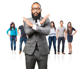 Obraz premium business black man doing a cross with arms
