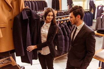 People in suit shop