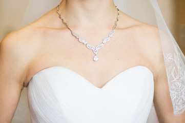 bride's neck line on her wedding day.