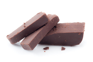 Broken chocolate bar on a white background