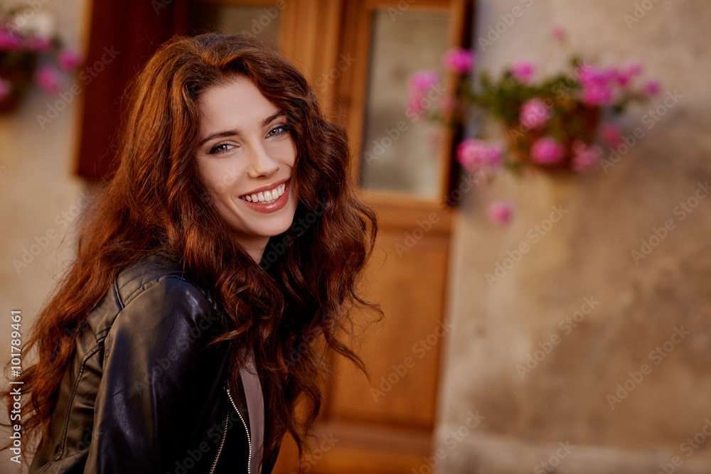 Canvas Prints Fashionably jacket woman on the streets of a  Italian town