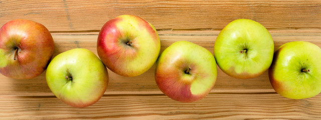 Apples on wooden table