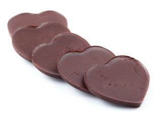 Chocolate hearts on white background