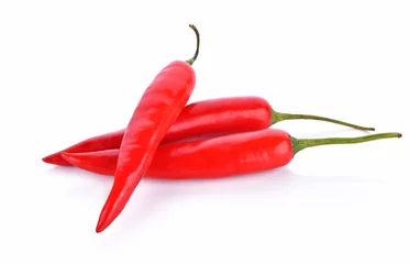 Fotobehang Red chilli peppers on white background © yothinpi