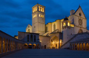 Fototapeta na wymiar Famous Basilica of Saint Francis of Assisi with Lower Plazain night. Assisi, Umbria, Italy