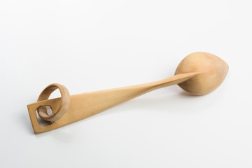 Wooden spoon on white background
