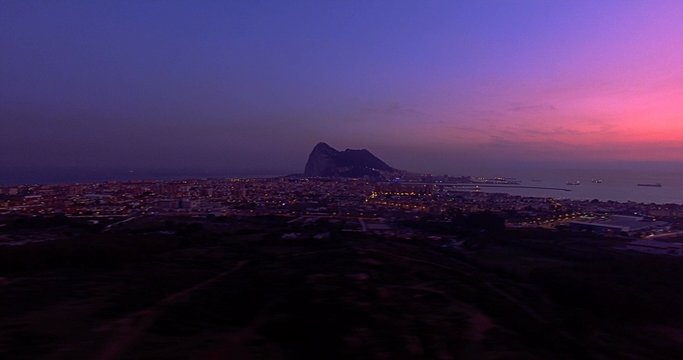 4K Aerial, Sunset and night flight near Gibraltar, Spain - additionally stabilized, graded and mostly accelerated