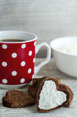 Heart shaped rye toasts with cream cheese