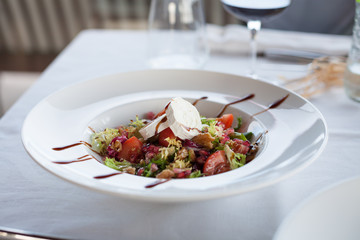 salad with goat cheese in restaurant