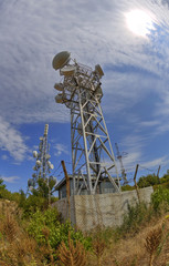Communication antenna towers in fish-eye perspective