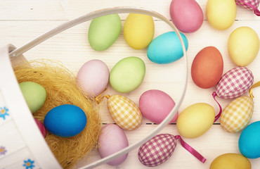 Retro easter basket and colorful easter eggs