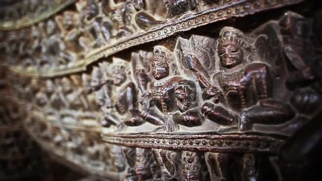 Rack focus shot of carving on the wall of a temple, Khajuraho Group Of Monuments, Khajuraho, Madhya Pradesh, India
