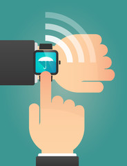 Hand pointing a smart watch with an umbrella