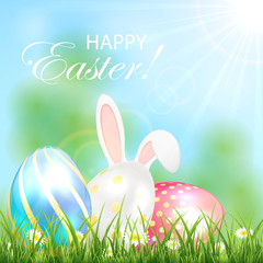 Easter background with shiny eggs and rabbit