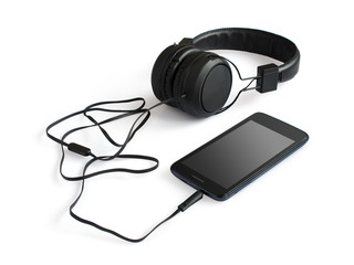 Black smartphone and headphones