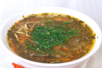 Delicious vegetable soup with fresh herbs.