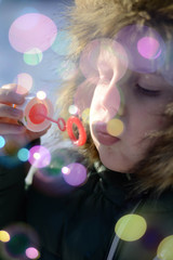 soap bubbles on the background of the child's face