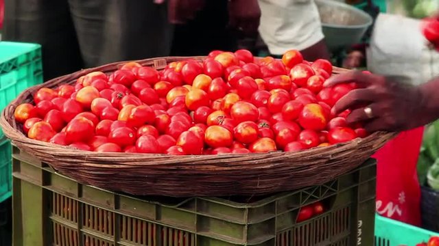 Locked-on shot of a heap of tomato at a market stall, Dadar Vegetable Market, Dadar, Mumbai, Maharashtra, India