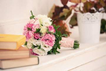 bridal bouquet from roses and books