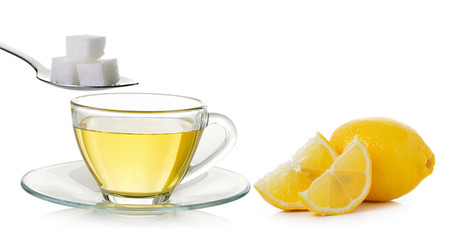 Glass cup of  lemon tea and sugar isolated on white background