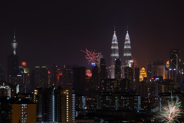 Fototapeta na wymiar KUALA LUMPUR, MALAYSIA - 1ST JANUARY 2016; New year's eve 2016 celebration over downtown Kuala Lumpur, Malaysia.