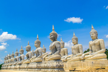 Fototapeta na wymiar Buddha statue and blue sky, Nakhon Si Thammarat Province, Thailand.