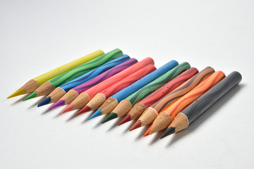 Colorful pencils isolated on white background.
