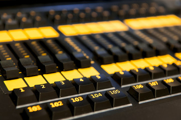 Sound mixer control panel, closeup.