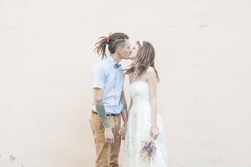 The couple with dreadlocks posing