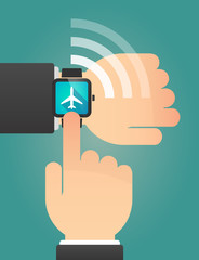 Hand pointing a smart watch with a plane