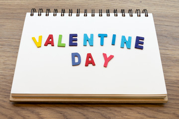 valentine day word on notebook with valentine's day concept