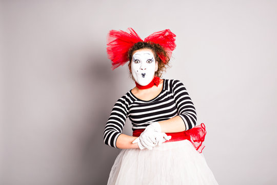 Portrait of a comedian  woman dressed up as a mime, April Fools Day concept