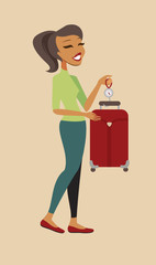 Fototapeta premium Woman cheking her suitcase weight before flight