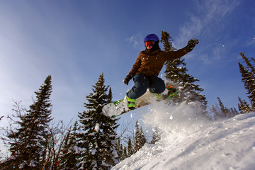 Snowboarder jumping