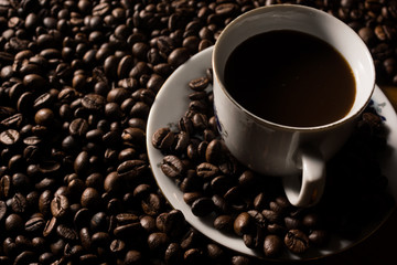 Coffe beans and cup.